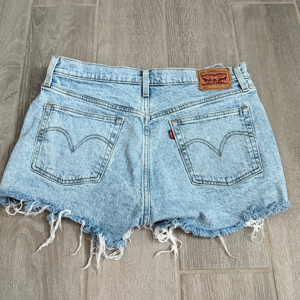 Levi’s Distressed Light Blue Denim Shorts